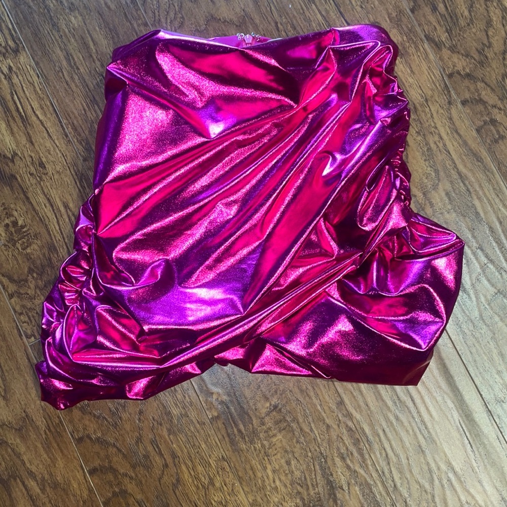 Fashion nova neon metallic pink mink skirt size medium but fits like a small.